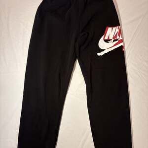 Nike Air Jordan Jumpman Logo Youth XL Black Fleece Joggers 95A434-023